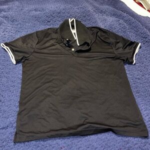 Men’s polo shirt. Light weight material very comfortable.